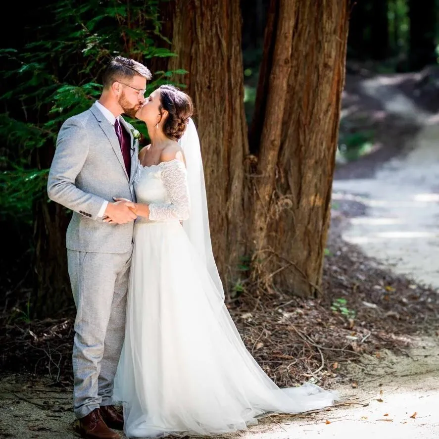 Ivory Off-The-Shoulder Lace and Tulle Train Wedding Gown 1162