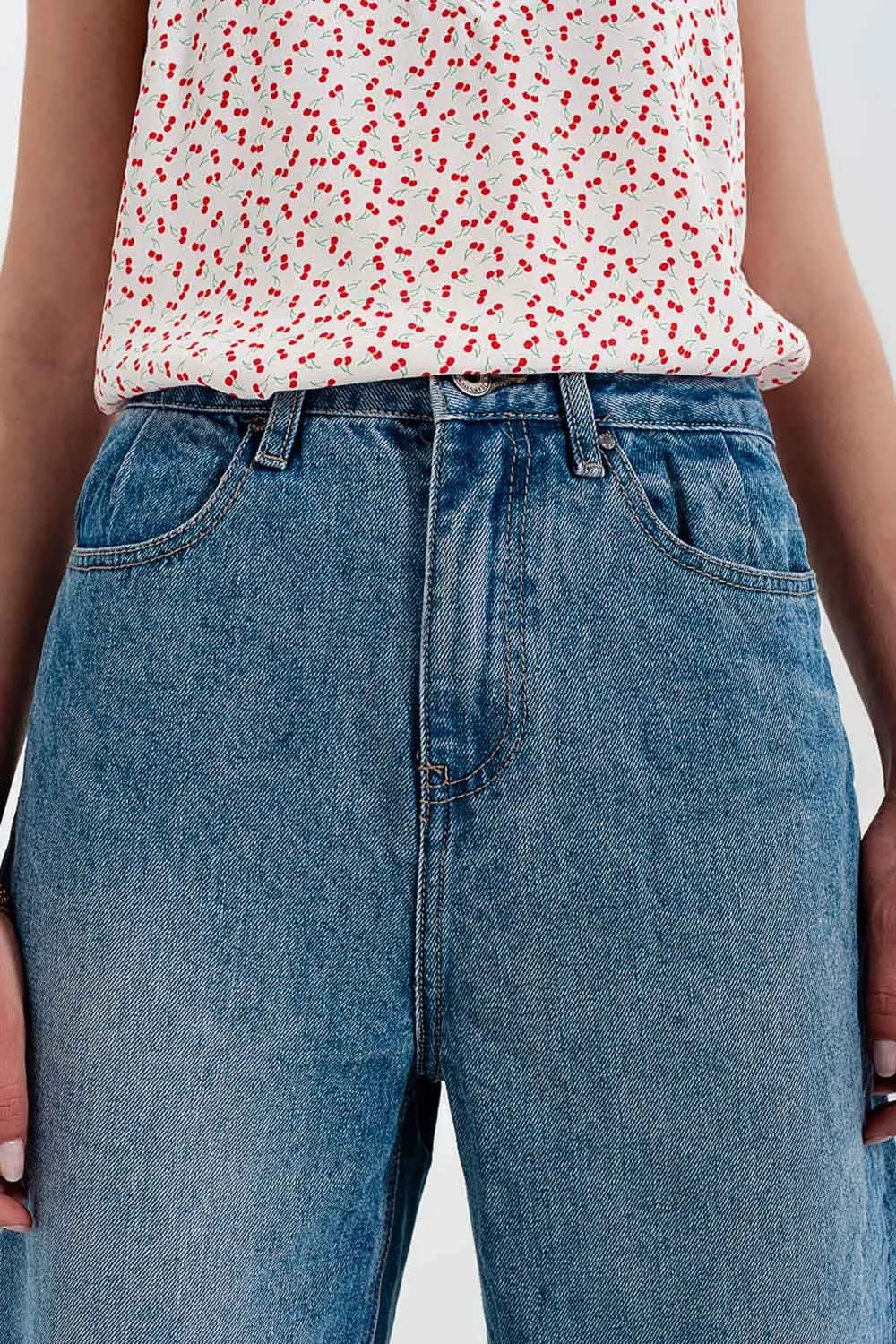 Relaxed fit side rip jeans in mid blue