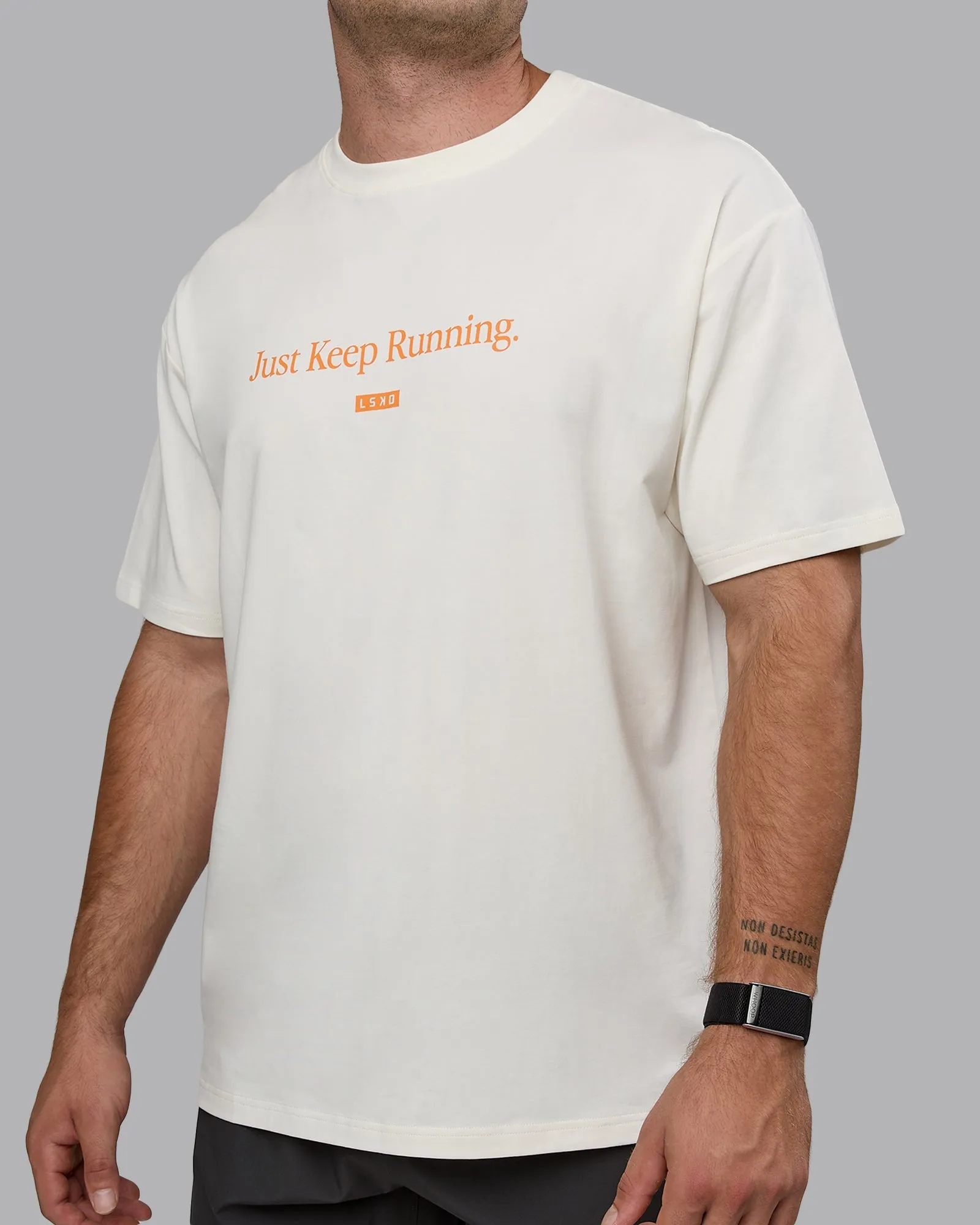 Unisex Just Keep Running FLXCotton Tee Oversize - Off White-Vibrant Orange