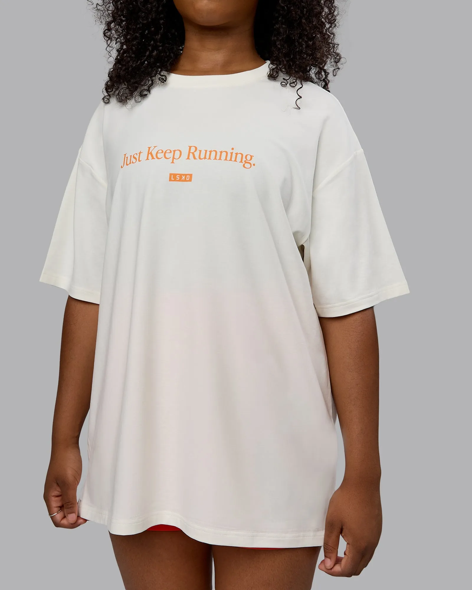 Unisex Just Keep Running FLXCotton Tee Oversize - Off White-Vibrant Orange