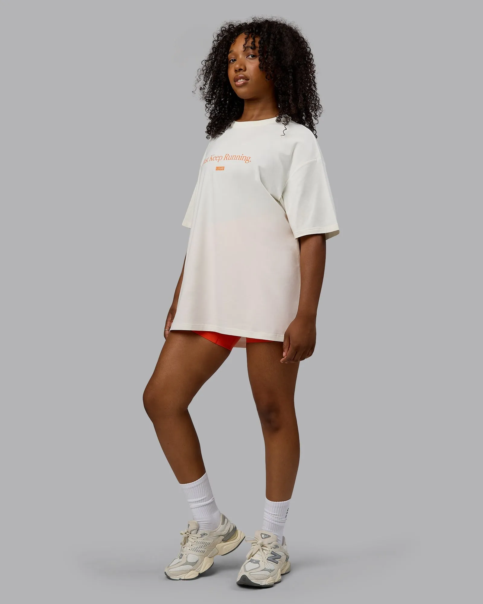 Unisex Just Keep Running FLXCotton Tee Oversize - Off White-Vibrant Orange