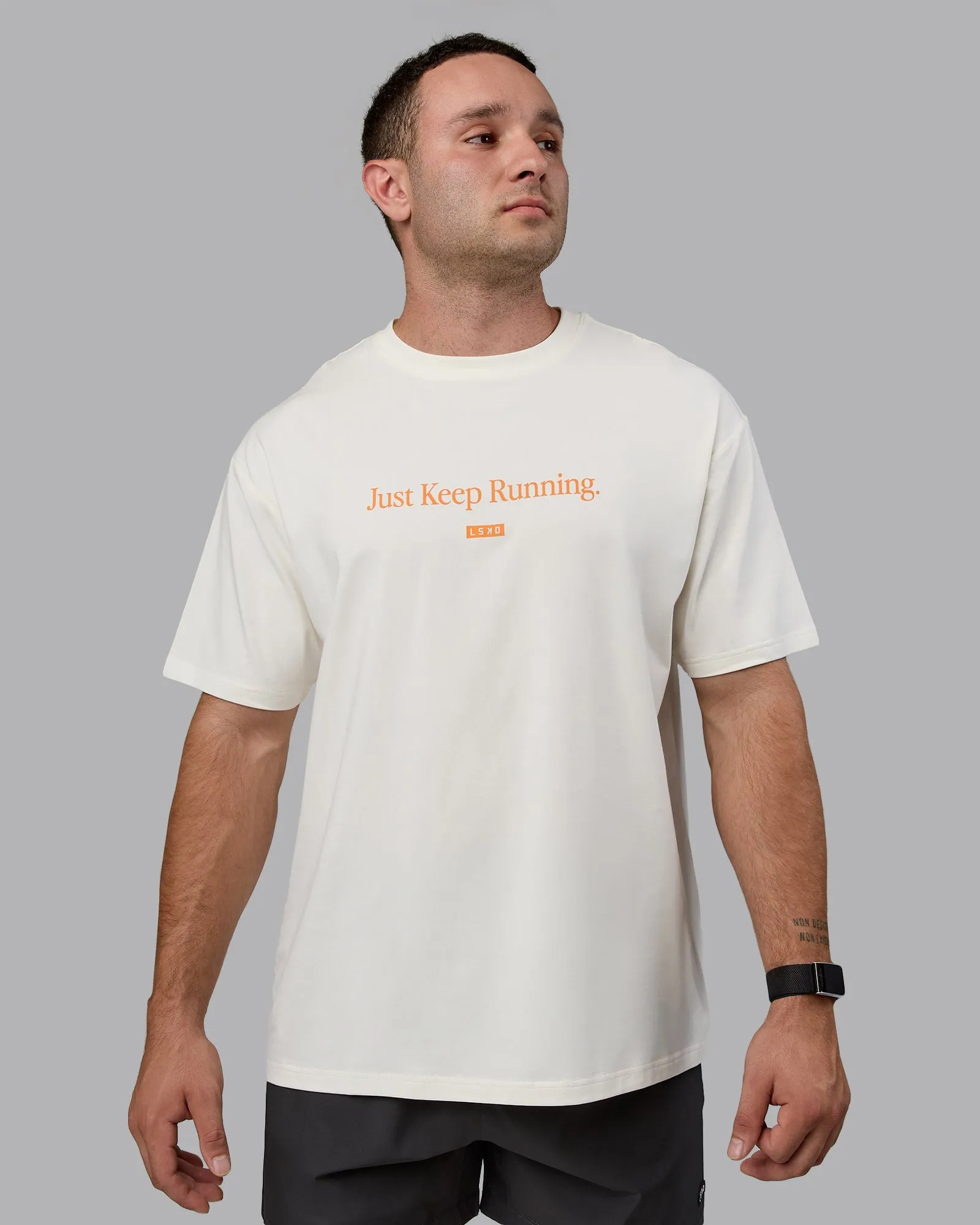 Unisex Just Keep Running FLXCotton Tee Oversize - Off White-Vibrant Orange