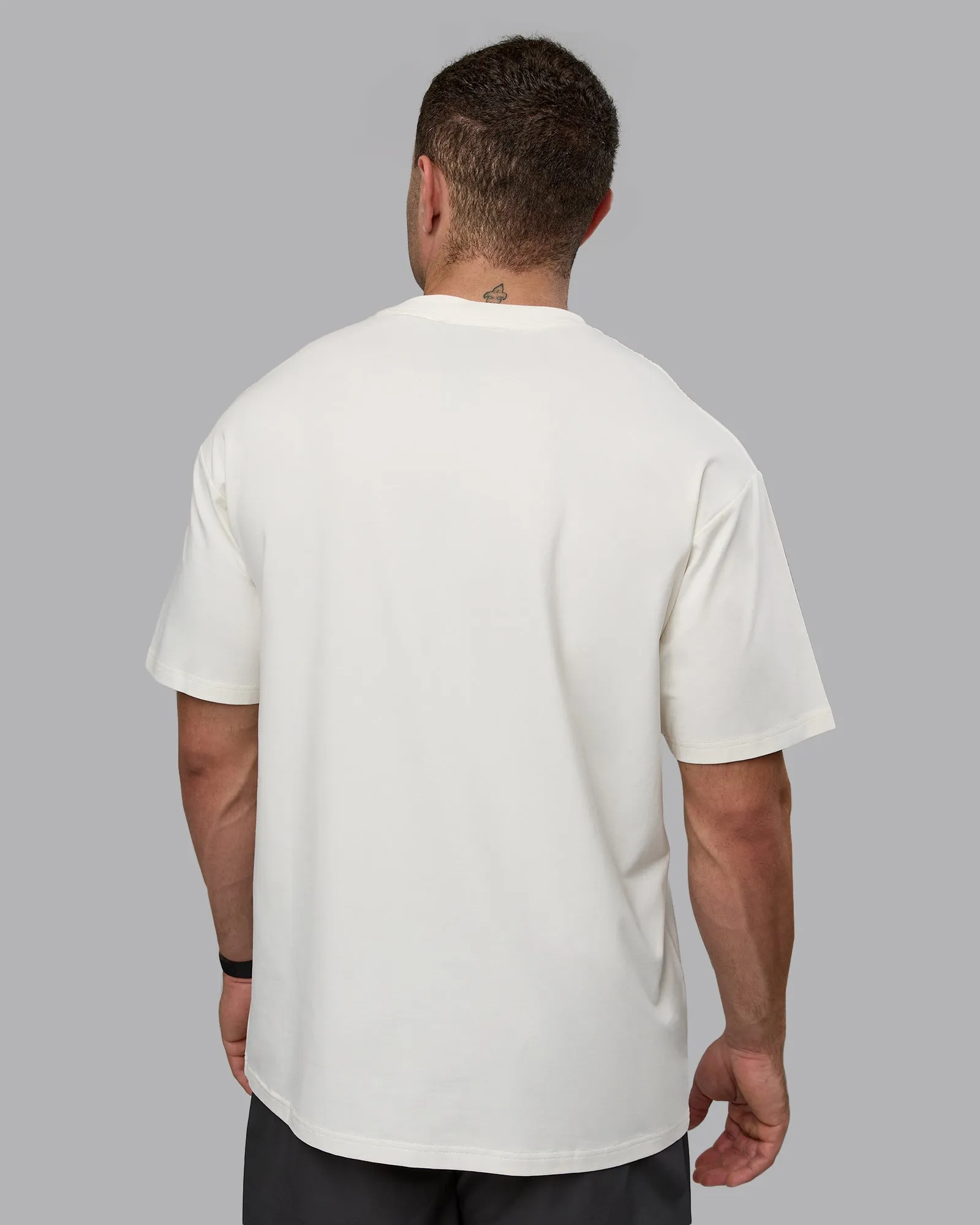 Unisex Just Keep Running FLXCotton Tee Oversize - Off White-Vibrant Orange